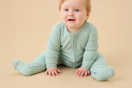 happy baby girl and boy in MORI's clever zip sleepsuits 